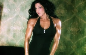 Muscle clad raven haired beauty Tracy Daniels