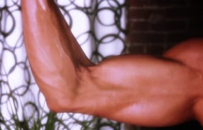 A very buff Marina Lopez flexing her muscles